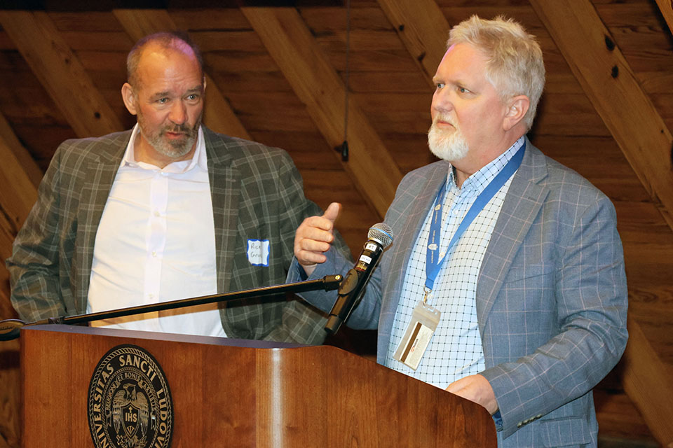 Rick Grucza, Ph.D., left, and Jeff Scherrer, Ph.D., were recognized at the Scholarly Works and Grant Winners Reception on Friday, April 5. Photo by Joe Barker. 