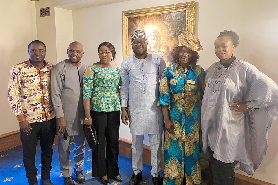 Two leaders of the African Graduate Professionals Network at SLU pose with the Leaders of the African Chamber of Commerce St Louis and African Diaspora Council. Photo by Prisca Enedah.