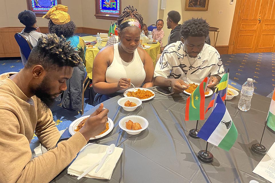 Some invited guests, and students had some jollof rice and puff-puff at the event. Photo by Prisca Enedah.