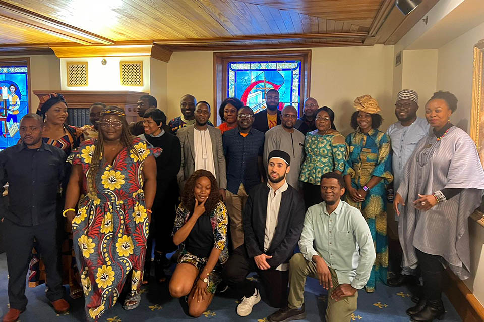 African graduate students at SLU take a photo with some of the invited speakers after the event. Photo by Prisca Enedah.
