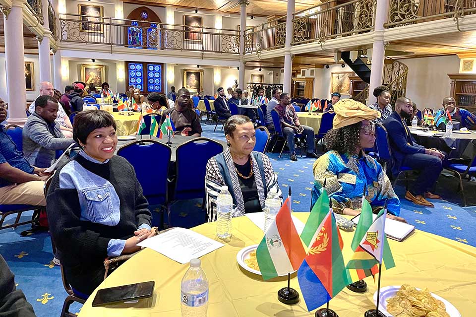 Special Assistant to SLU President Nicci Roach seated with a friend and the Co-Chair of the African Chamber of Commerce St Louis, Arinola Sholanke. Photo by Prisca Enedah.