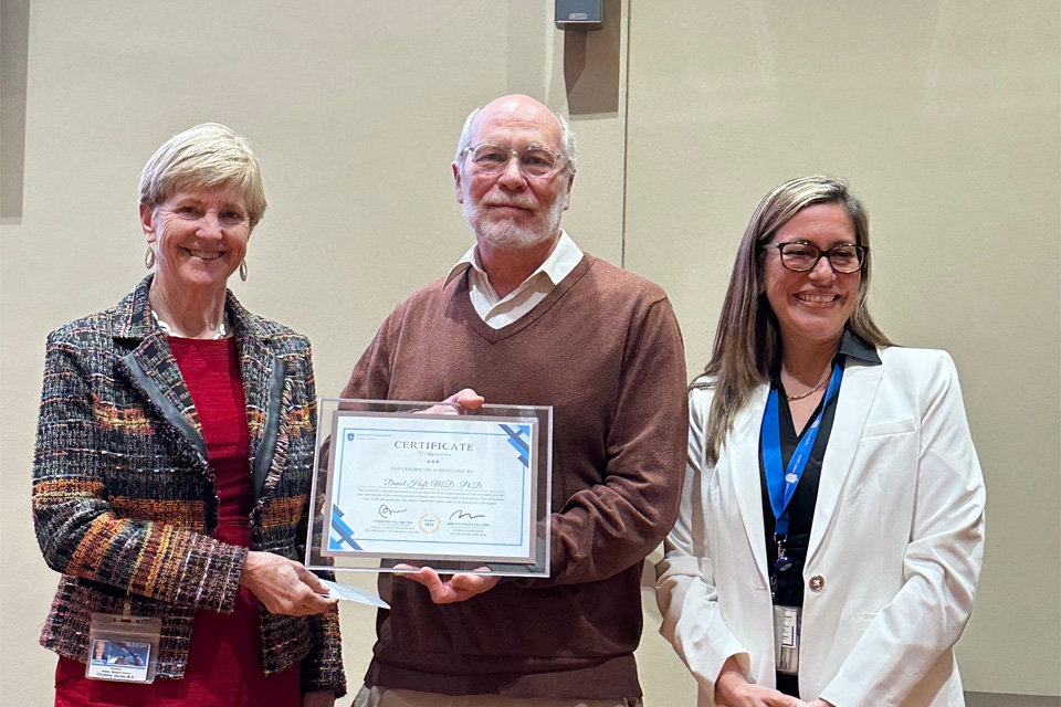 Various faculty and staff members were recognized for their research excellence during Science Day