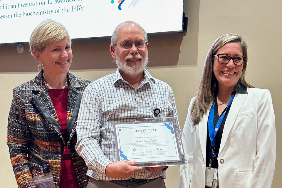 Various faculty and staff members were recognized for their research excellence during Science Day
