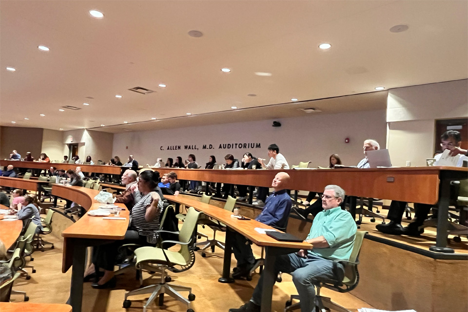 Faculty students and staff listen to Daniela Salvemini, Ph.D. as the plenary speaker