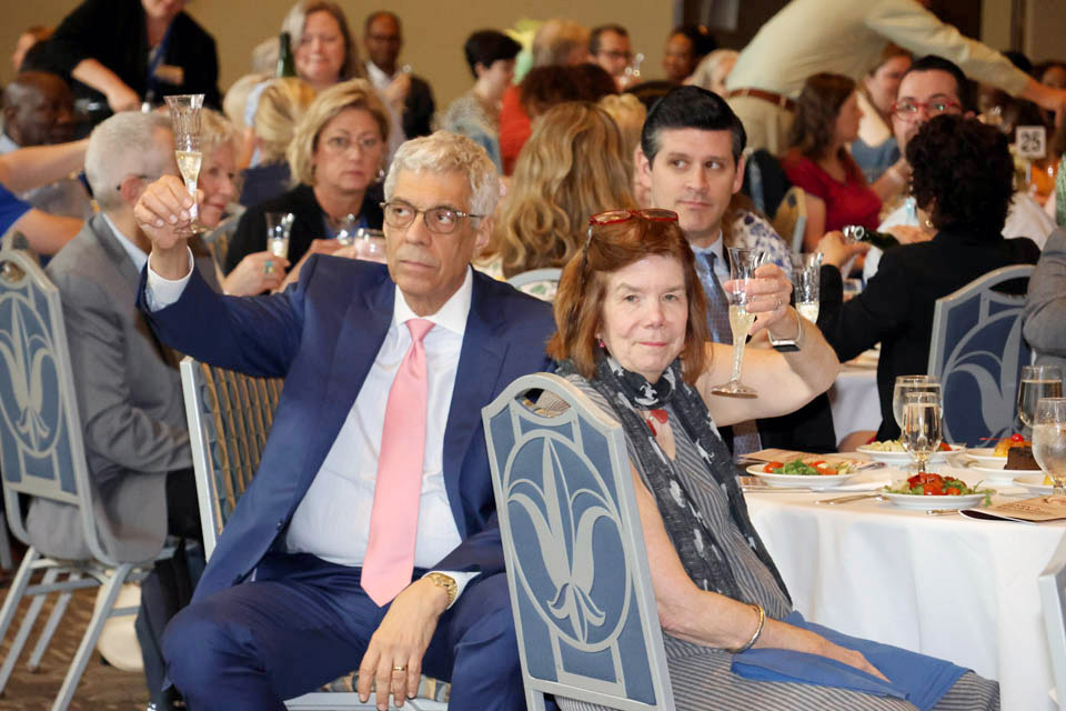 SLU President Fred P. Pestello, Ph.D., and First Lady Fran Pestello, Ph.D., raise their glasses for a toast at the 47th annual Mary A. Bruemmer Recognition Ceremony and Luncheon on Monday, May 6. Photo by Joe Barker.