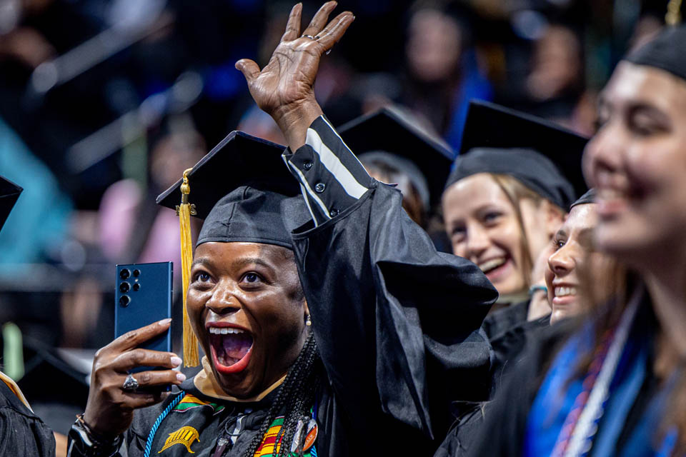 Graduates celebrate during Commencement on May 18, 2024. Photo by Sarah Conroy. 
