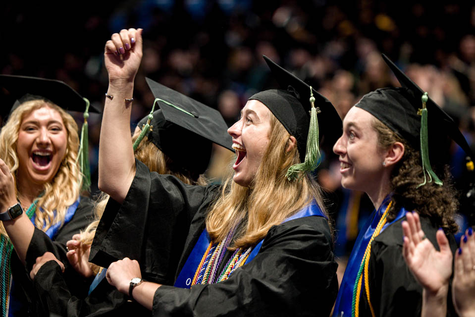 Graduates celebrate during Commencement on May 18, 2024. Photo by Sarah Conroy. 