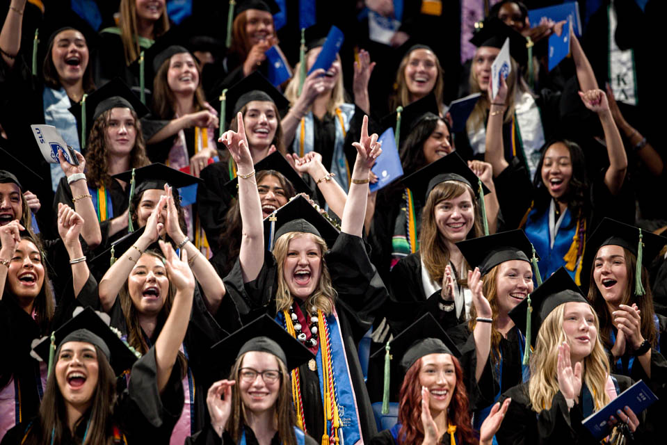 Graduates celebrate during Commencement on May 18, 2024. Photo by Sarah Conroy. 