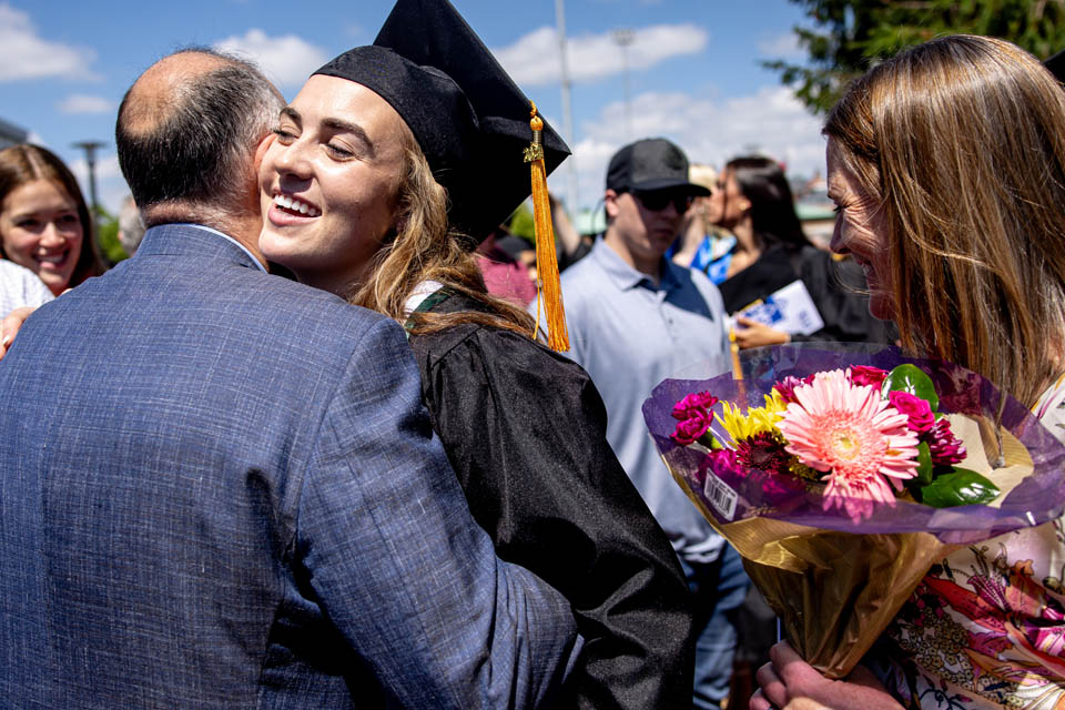 Graduates celebrate after Commencement on May 18, 2024. Photo by Sarah Conroy. 