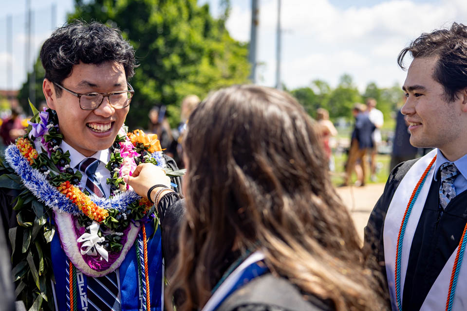 Graduates celebrate after Commencement on May 18, 2024. Photo by Sarah Conroy. 
