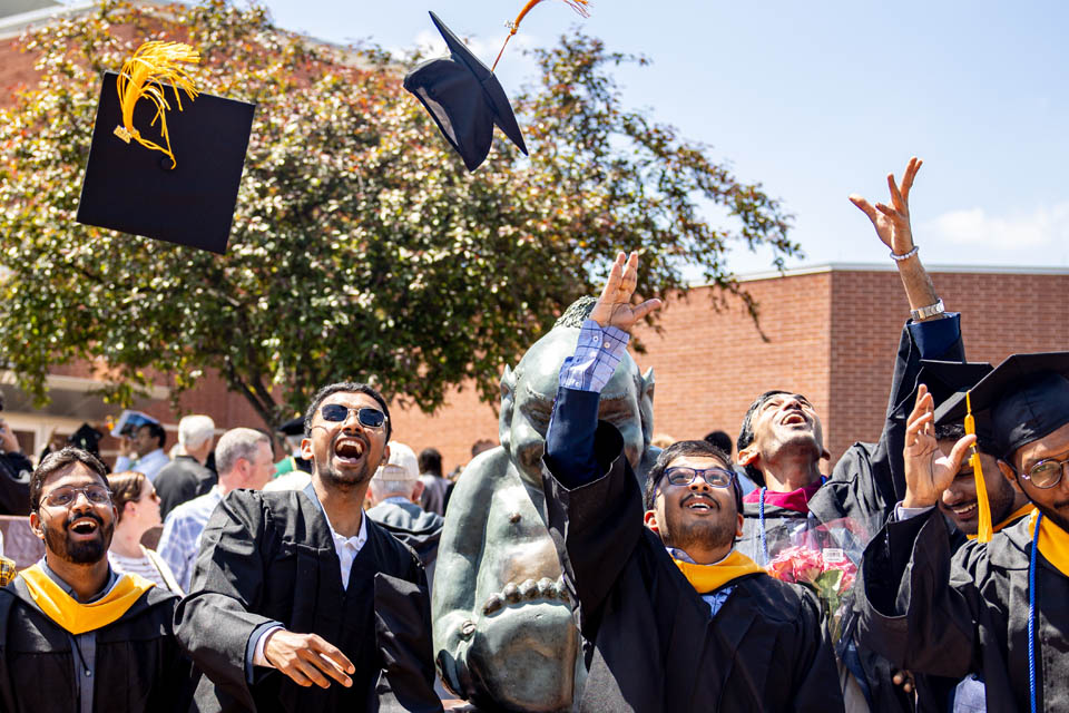 Graduates celebrate after Commencement on May 18, 2024. Photo by Sarah Conroy. 