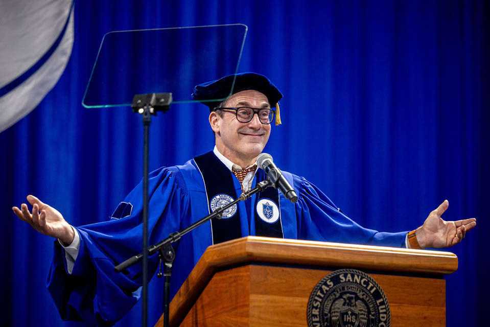 Commencement speaker Jon Hamm addresses the crowd at Chaifetz Arena on Saturday, May 18, 2024. Photo by Sarah Conroy. 