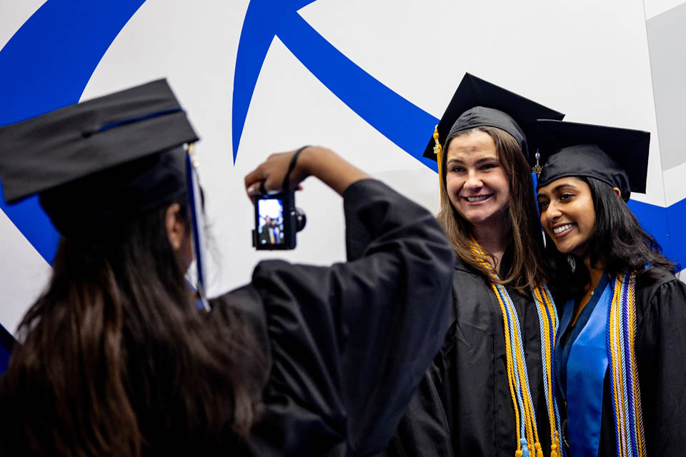 Graduates take a photo before Commencement on May 18, 2024. Photo by Sarah Conroy. 