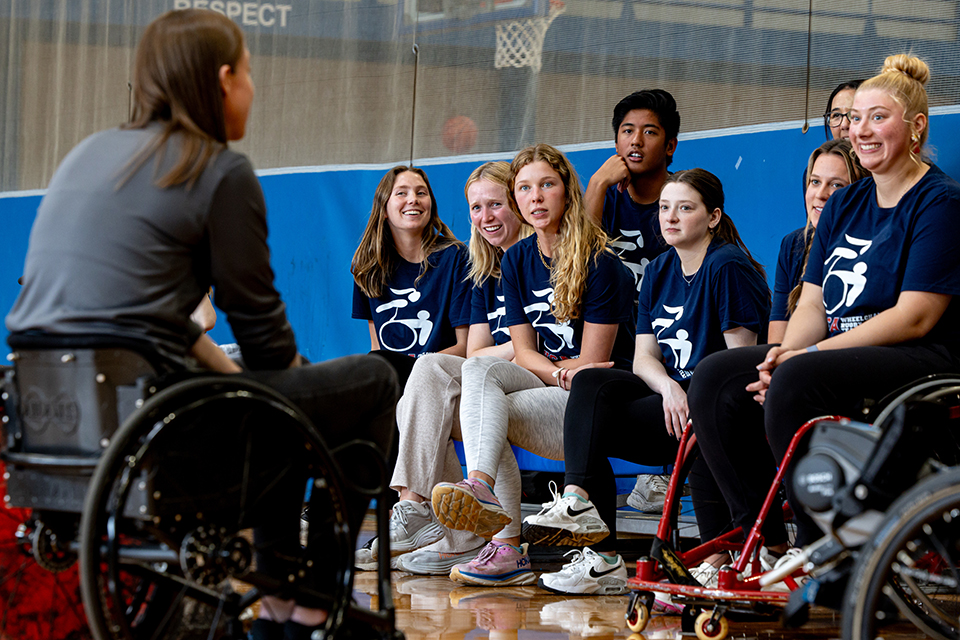 Sarah Adam, OTD, assistant professor of occupational science and occupational therapy at SLU, speaks with her students during DASA (Disabled Athlete Sports Association) Day on April 22, 2024. Photo by Sarah Adam.