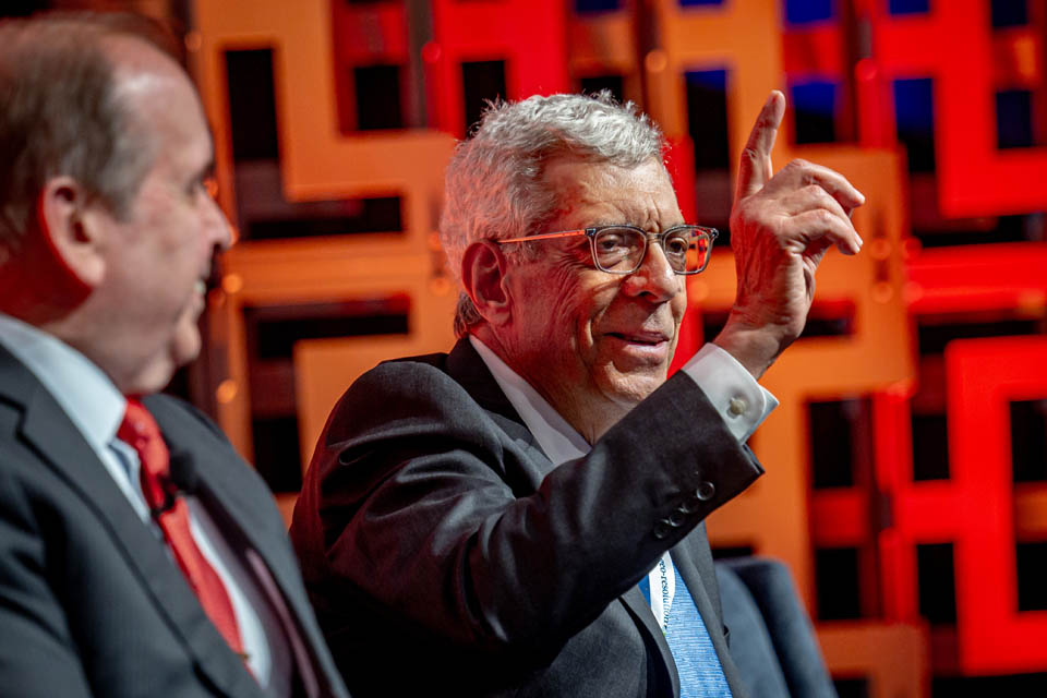 President Fred P. Pestello, Ph.D., right, speaks as William Caniano, West Executive and director of the office of corporate communications of the National Geospatial-Intelligence Agency, left, listens during the Leaders Look panel of the Geo-Resolution Conference on Sept.12, 2024. Photo by Sarah Conroy.