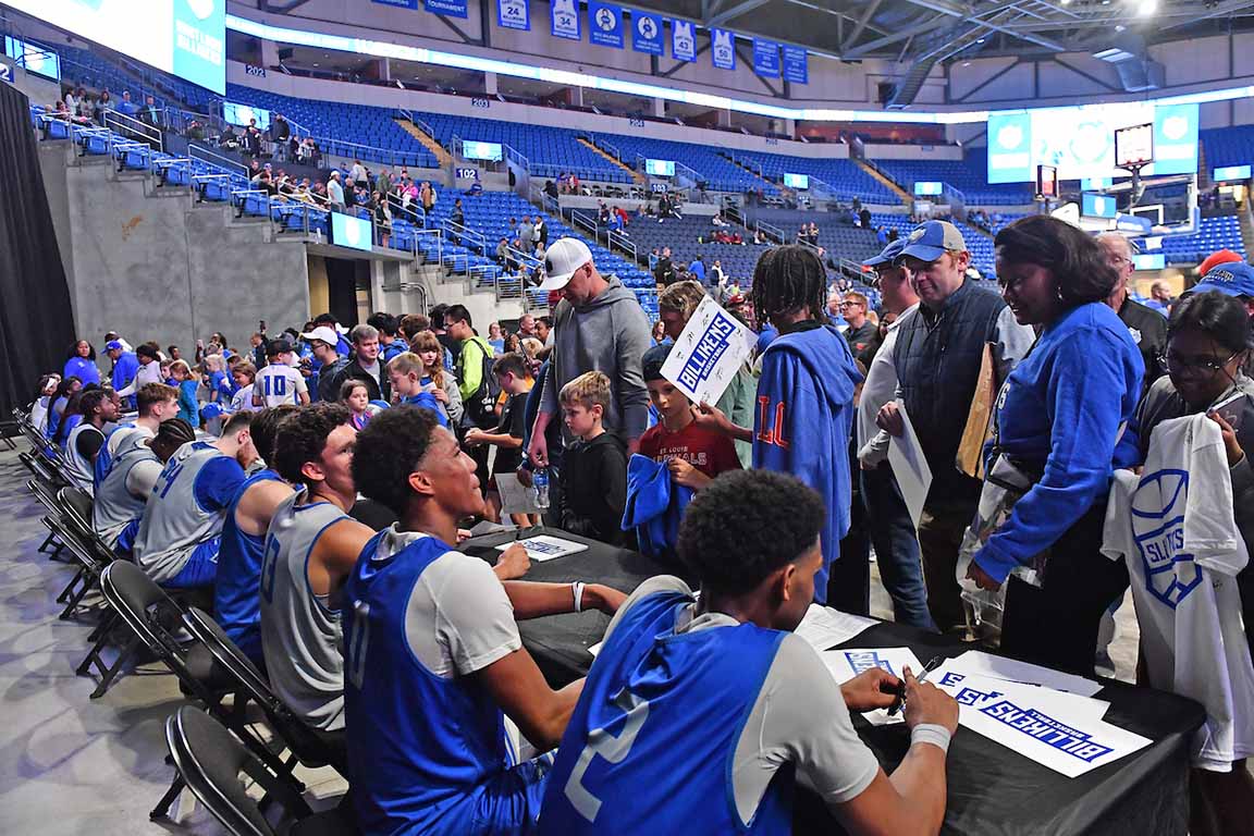 Fans meet members of the men's basketball team at Billikens Basketball Night.