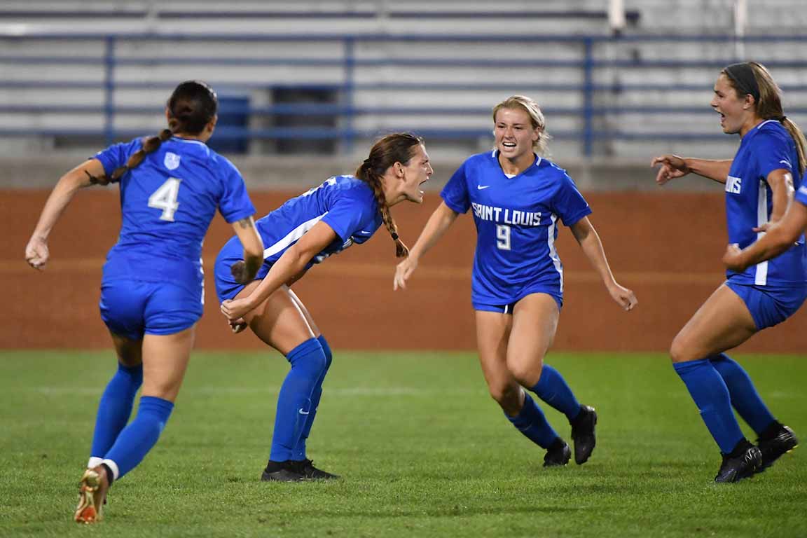Players on SLU's women's soccer team celebrate at the Thursday game against Loyola Chicago, which ended in a tie. 