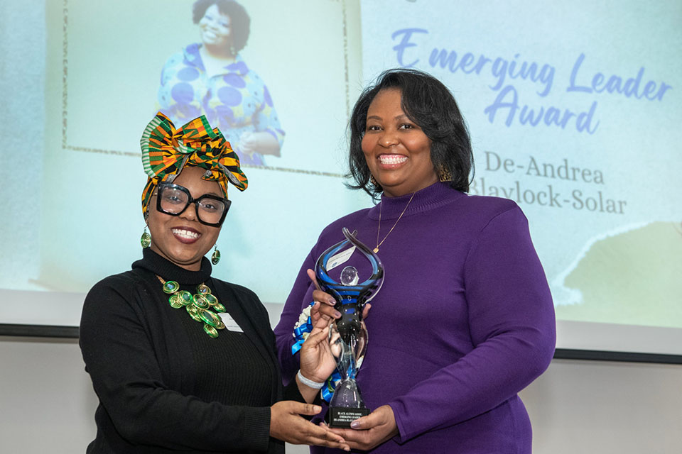 Dr. De-Andrea Blaylock-Solar accepts the 2024 Emerging Leader Award. Photo by Steve Dolan.