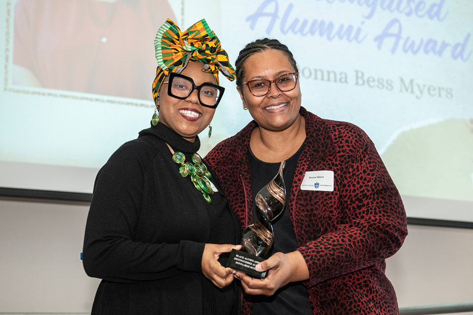 Donna Bess Myers accepts the 2024 Distinguished Black Alumni Award. Photo by Steve Dolan.