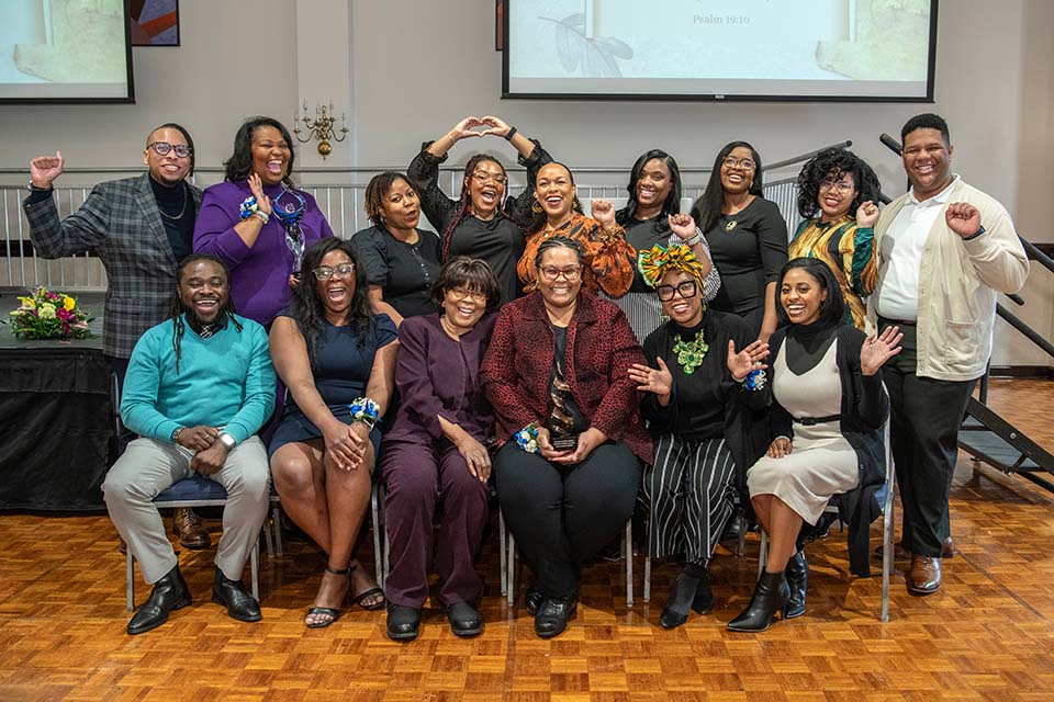 Black Alumni Association members pose for a photo together at the group's annual award presentation ceremony. Photo by Steve Dolan.