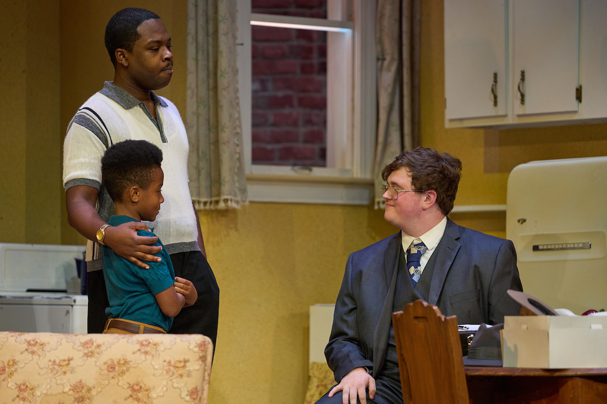 Dwayne Mose III as Walter Lee, Jackson Little as Travis, and Anthony Chaboude as Karl Lindner. Photo by ProPhotoSTL