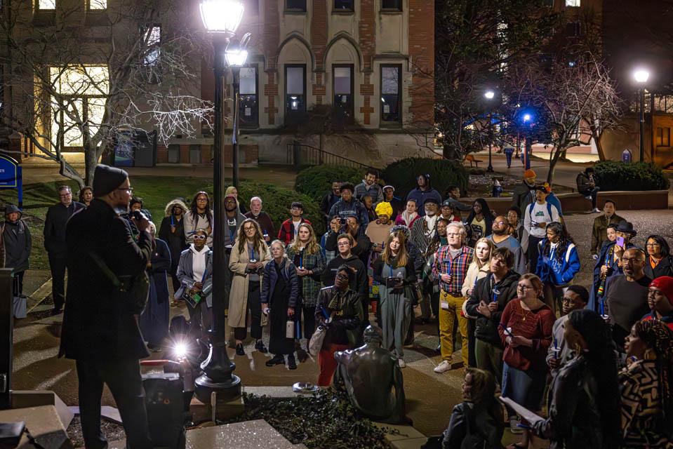 Jonathan Pulphus, Jr. gives a tribute to Jonathan Smith at the clock tower during the Lights of Remembrance Candlelight Vigil on Feb. 27, 2025. Photo by Sarah Conroy. 