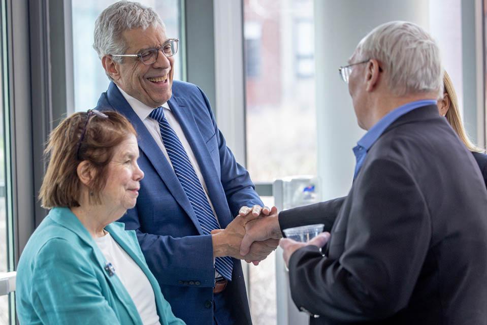 Fran Pestello, Ph.D., and Fred P. Pestello, Ph.D., greet Rex Sinquefield before the dedication of the Sinquefield Science and Engineering Center on March 18, 2025. Photo by Sarah Conroy. 