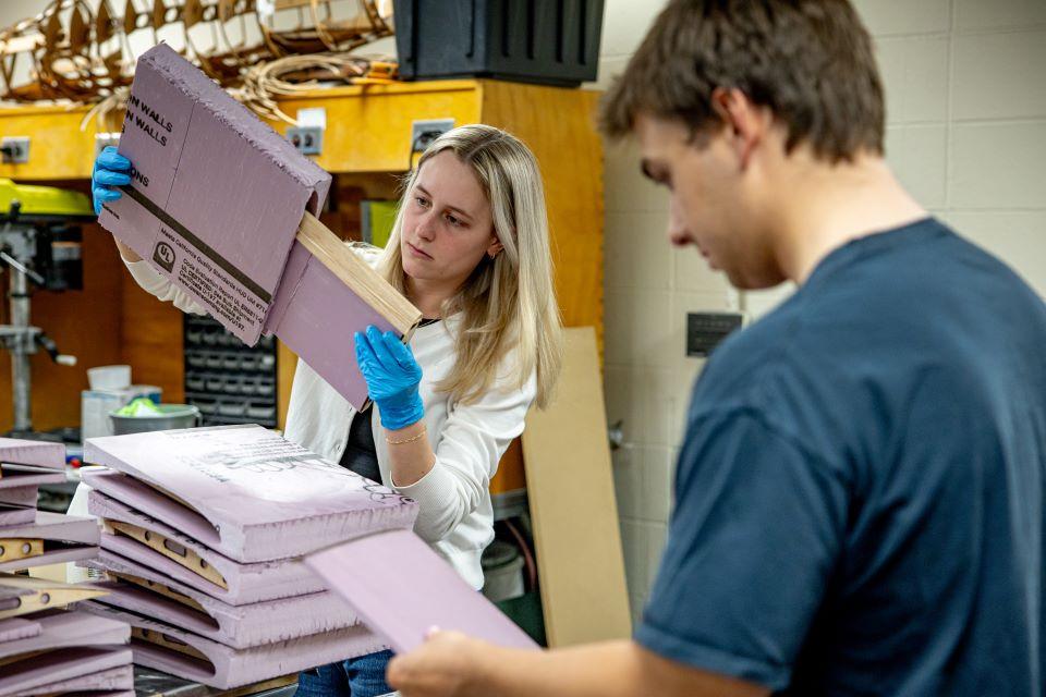 Mia Arndt, left, and Nathan Mercier work in the AirCRAFT Lab. Photo by Sarah Conroy.