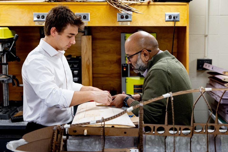 Srikanth Gururajan, Ph.D, right, and Nathan Mercier work in the AirCRAFT Lab. Photo by Sarah Conroy.