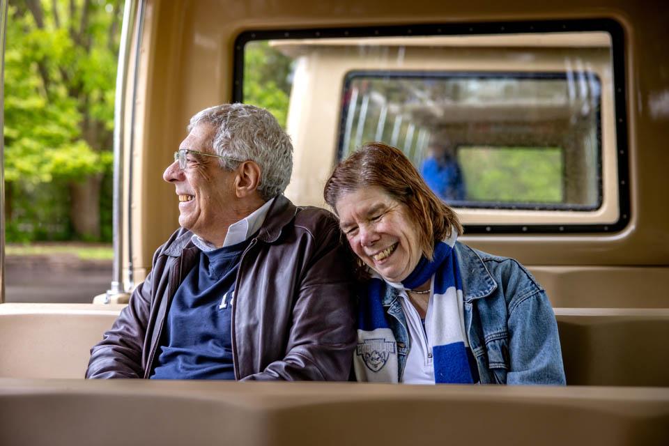 President Fred P. Pestello, Ph.D., and First Lady Fran Pestello, Ph.D., enjoy a tram ride during a celebration for the Pestellos with the SLU community at Grant’s Farm on April 27, 2025. Photo by Sarah Conroy.
