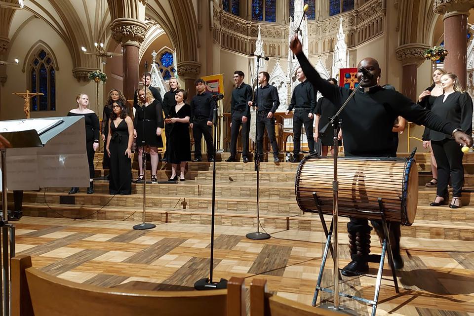 Fr. Thomas Sserwadda, a doctoral student studying at Saint Louis University, performing in St. Francis Xavier College Church. Submitted photo.