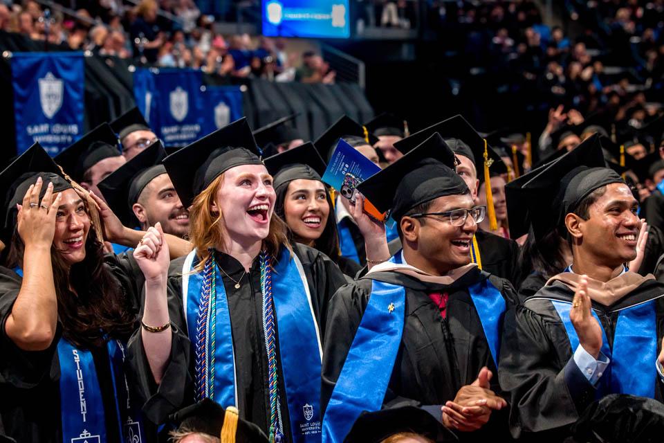 Graduates from the Richard A. Chaifetz School of Business cheer during Commencement on May 17, 2025. Photo by Sarah Conroy.