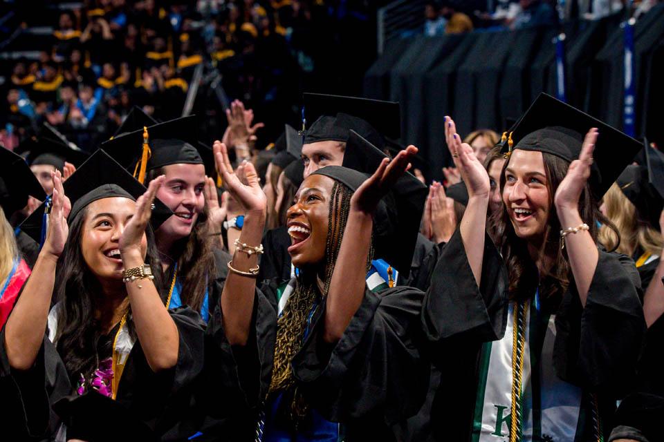 Graduates from the Trudy Busch Valentine School of Nursing cheer during Commencement on May 17, 2025. Photo by Sarah Conroy.