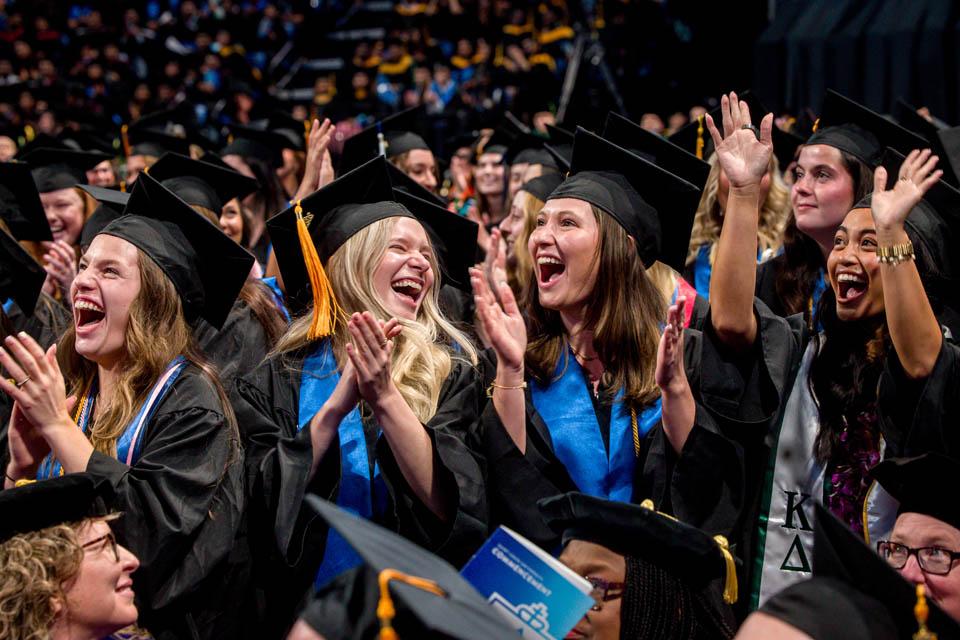 Graduates from the Trudy Busch Valentine School of Nursing cheer during Commencement on May 17, 2025. Photo by Sarah Conroy.