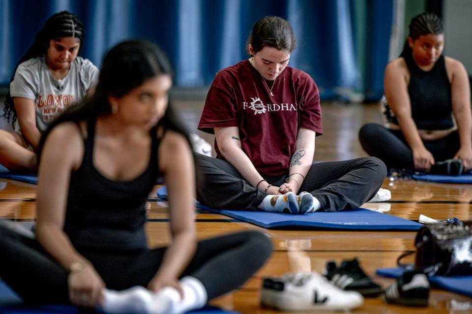 Student leaders from Jesuit schools participate in a yoga session during the 2025 National Jesuit Student Leadership Conference on July 24, 2025. Photo by Sarah Conroy.