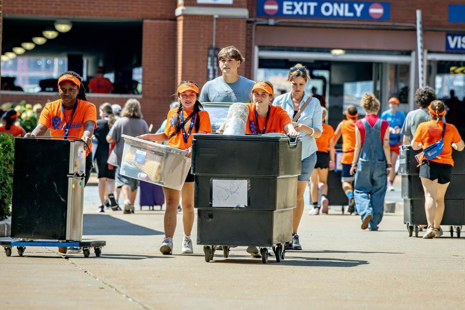 Families move into residence halls during first-year student move-in on Friday, Aug.  15, 2025. Photo by Sarah Conroy.