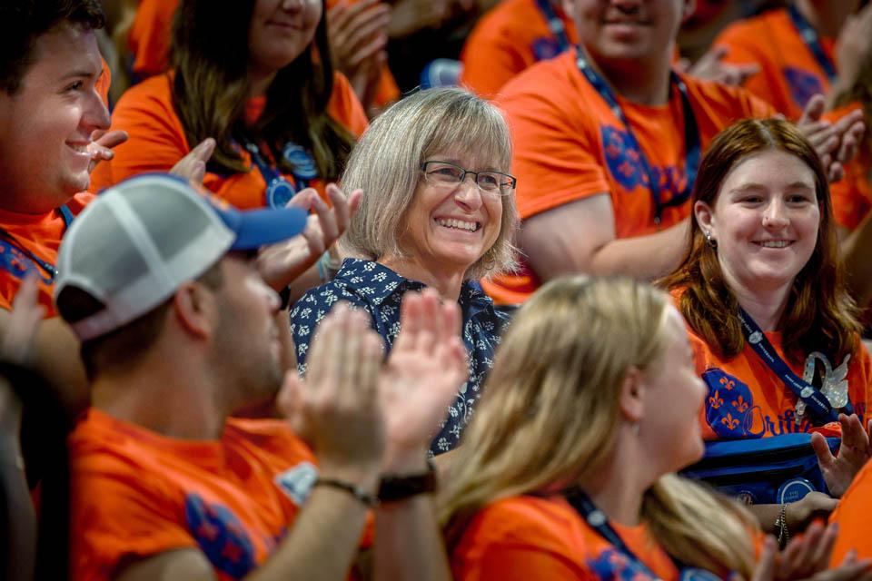 Kathy Feser is cheered by Oriflamme during Convocation on Saturday, Aug. 16, 2025. Photo by Sarah Conroy. 
