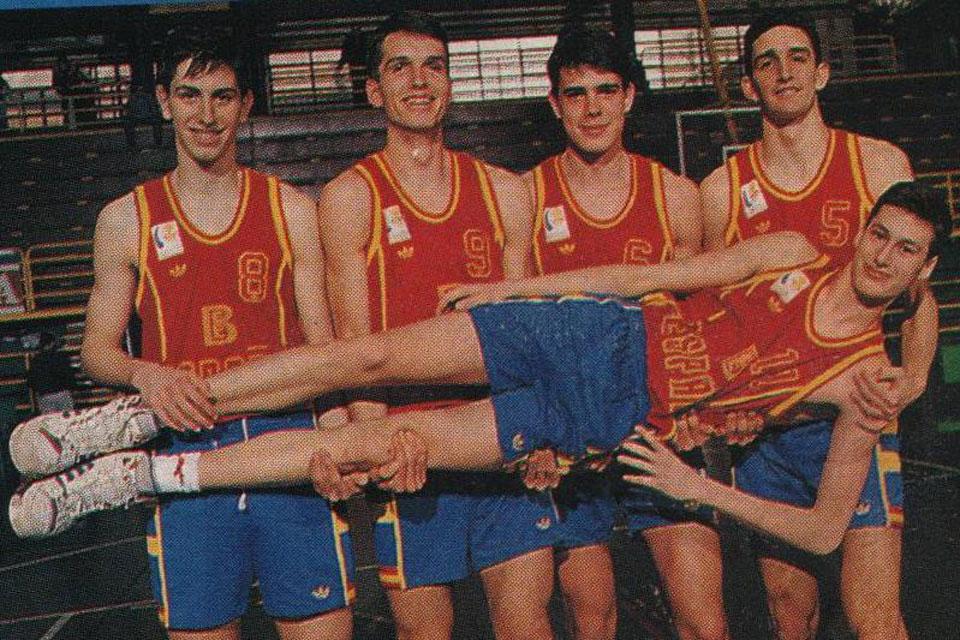 César Rioja Álvarez (second from left) clowns around with teammates on Spain's national basketball team. Rioja is now sports director at SLU-Madrid.