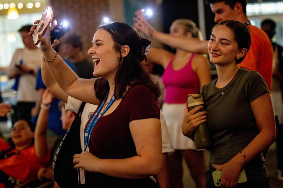 Students participate in karaoke during the Billiken Block Party on Aug. 16, 2025. Photo by Sarah Conroy.