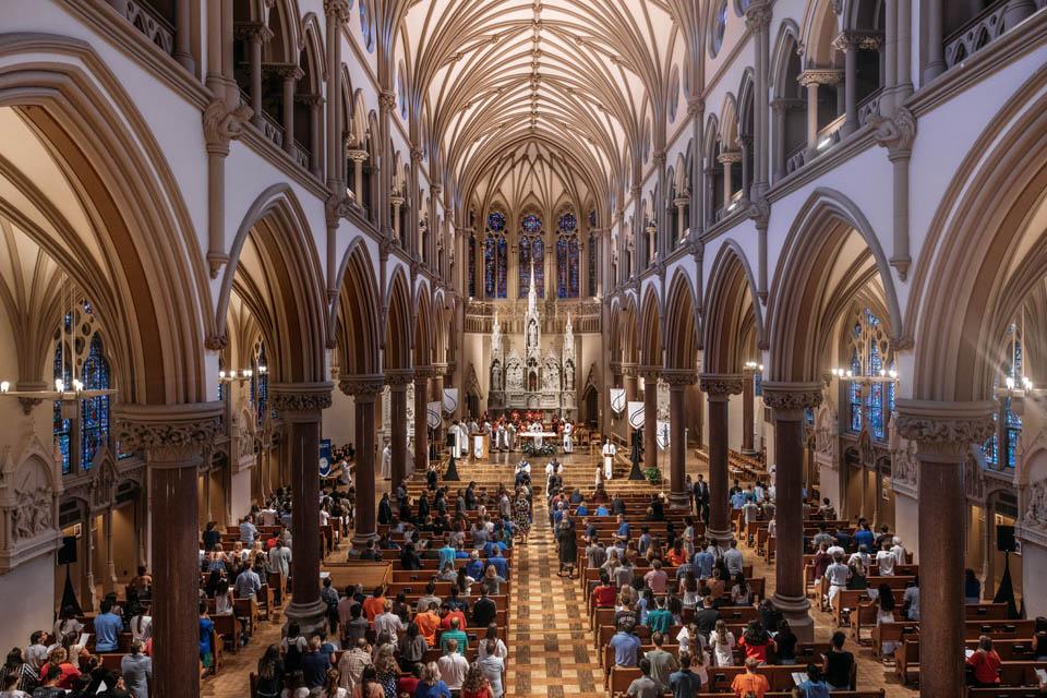 A full interior of the SLU community at the Mass of the Holy Spirit. 