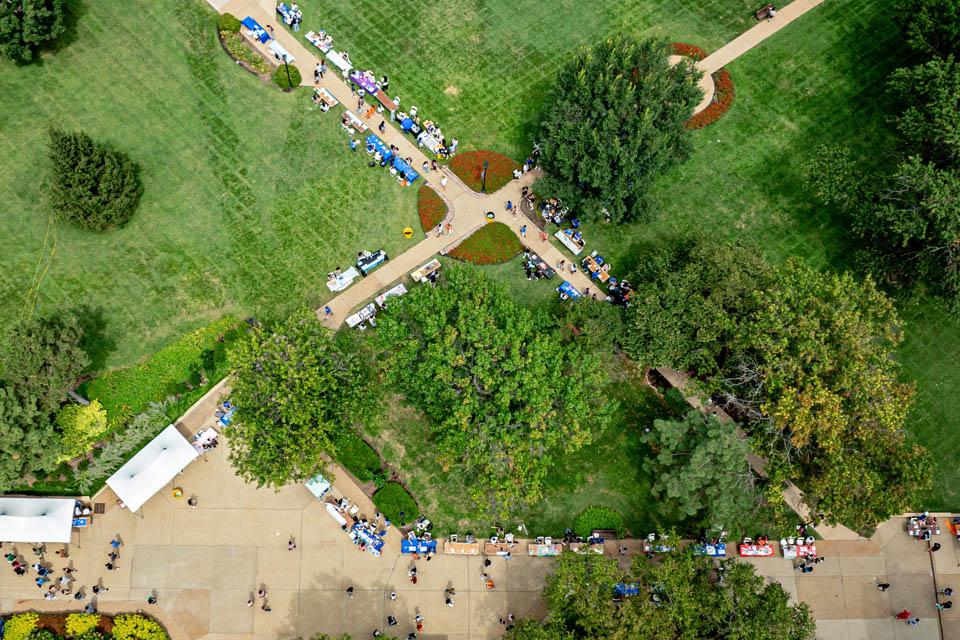 Students learn about campus clubs during the SLU Involvement Fair on Aug. 23, 2025. Photo by Sarah Conroy.