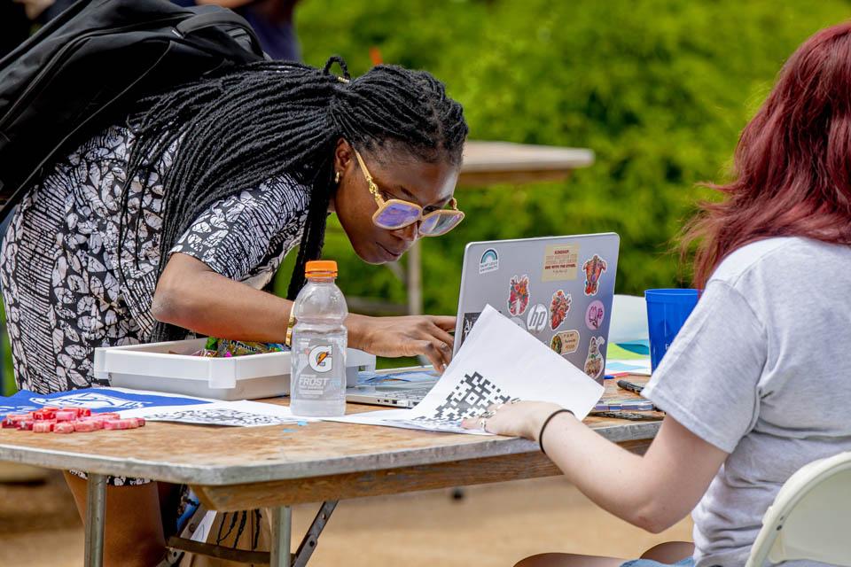 Students learn about campus clubs during the SLU Involvement Fair on Aug. 23, 2025. Photo by Sarah Conroy.