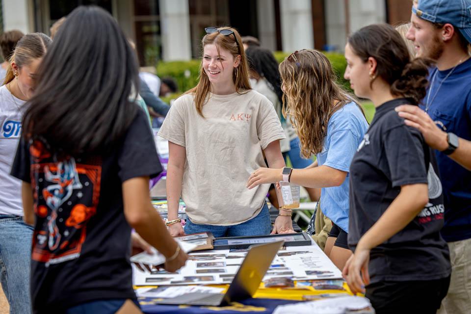 Students learn about campus clubs during the SLU Involvement Fair on Aug. 23, 2025. Photo by Sarah Conroy.