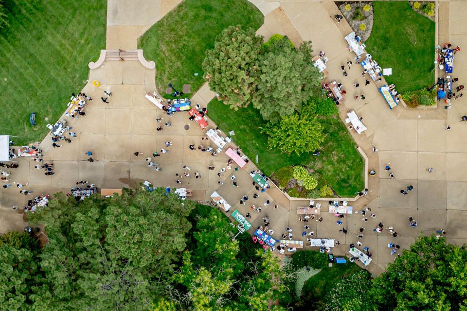 Students learn about campus clubs during the SLU Involvement Fair on Aug. 23, 2025. Photo by Sarah Conroy.