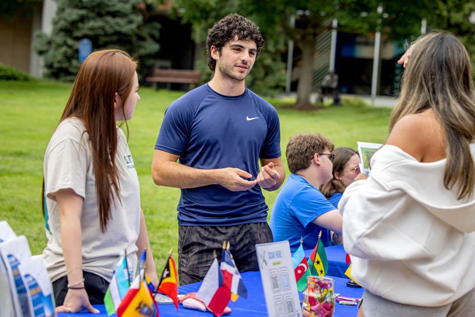 Students learn about campus clubs during the SLU Involvement Fair on Aug. 23, 2025. Photo by Sarah Conroy.