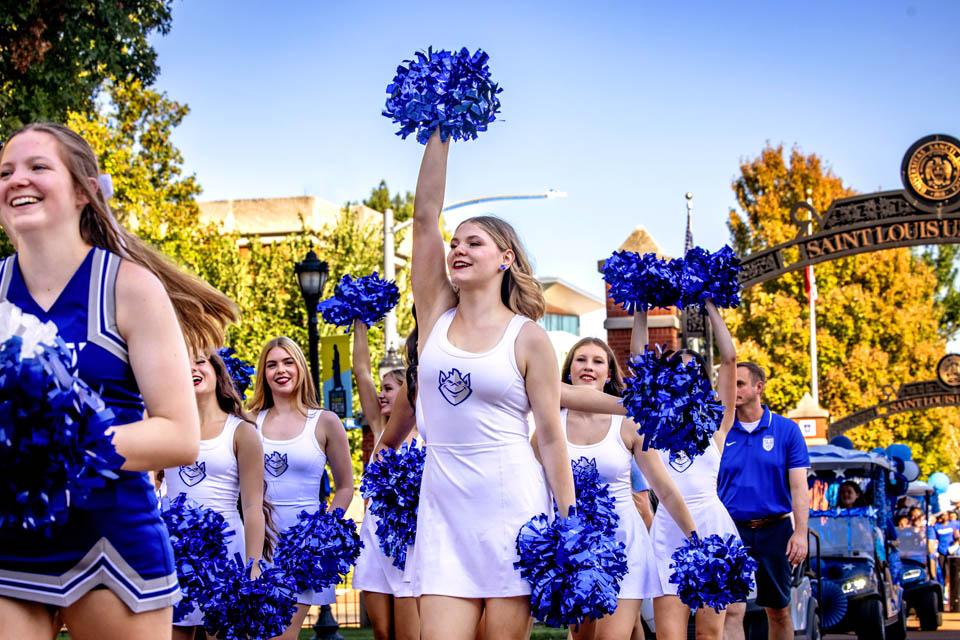 The Cheer team walks in the Homecoming and Family Weekend Golf Cart Parade on Sept. 27, 2025. Photo by Sarah Conroy. 