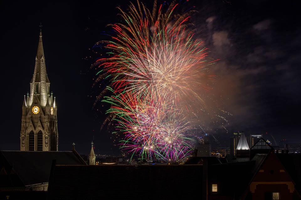 Fireworks explode near St. Francis Xavier College Church during Homecoming and Family Weekend on Sept. 27, 2025. Photo by Sarah Conroy. Photo by Sarah Conroy. 
