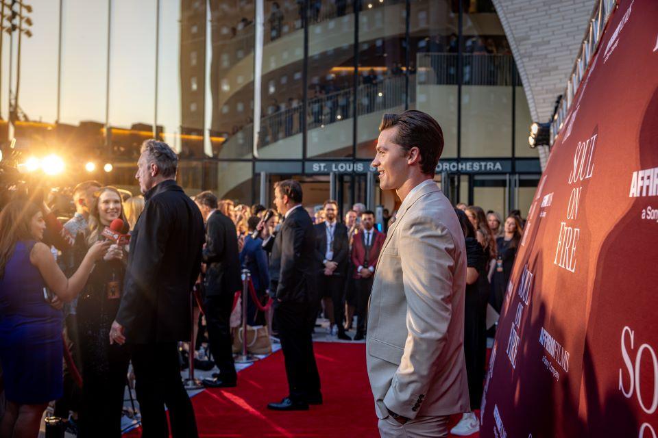 Actor Joel Courtney is photographed on the red carpet during the world premiere of Soul on Fire at Powell Hall on October 2, 2025. Photo by Sarah Conroy. 