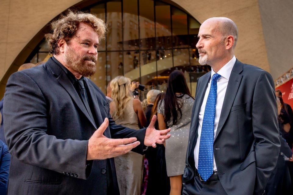 President Edward Feser, Ph.D, right, talks with director Sean McNamara, left, during the world premiere of Soul on Fire at Powell Hall on October 2, 2025. Photo by Sarah Conroy. 