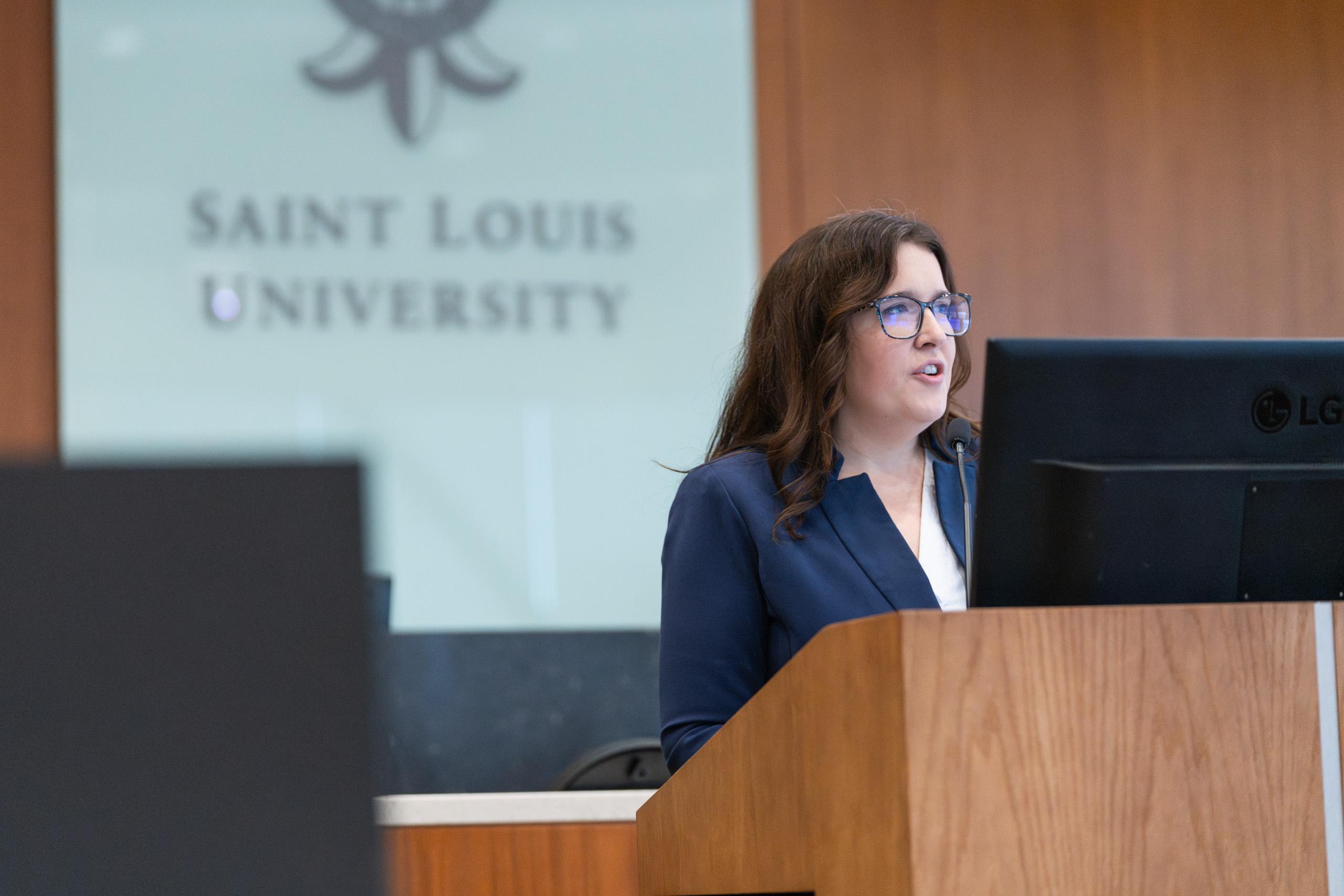 Law student Miranda Martin, the Childress Lecture managing editor for the Saint Louis University Law Journal, addresses the audience